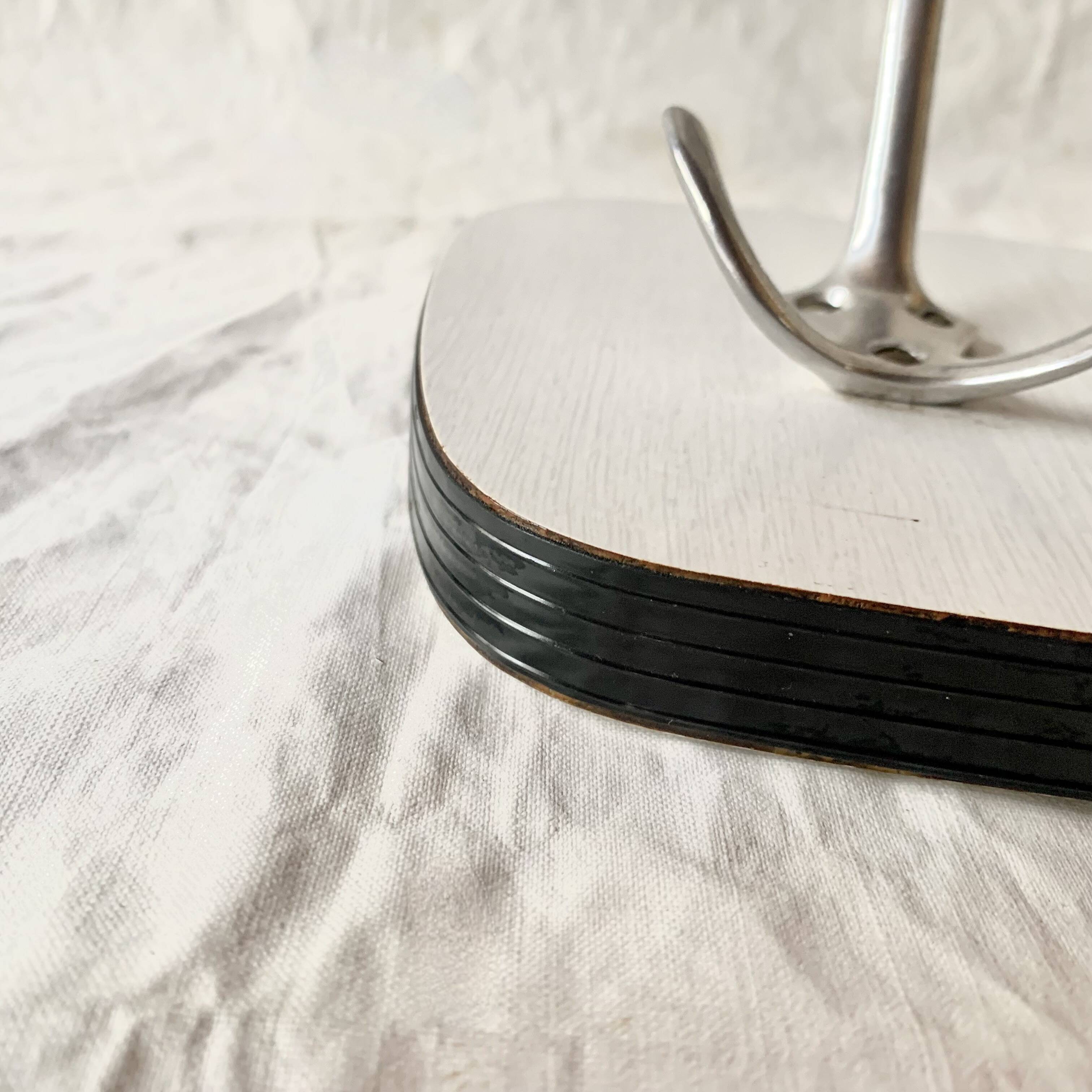 Vintage wall coat rack in white Formica - 4 cast aluminum coat hooks