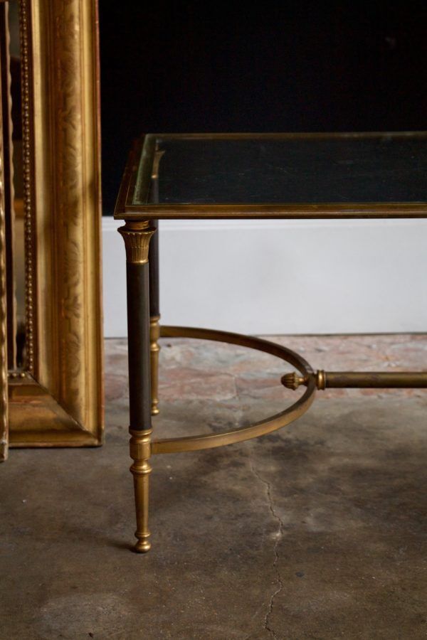 Glass and brass coffee table