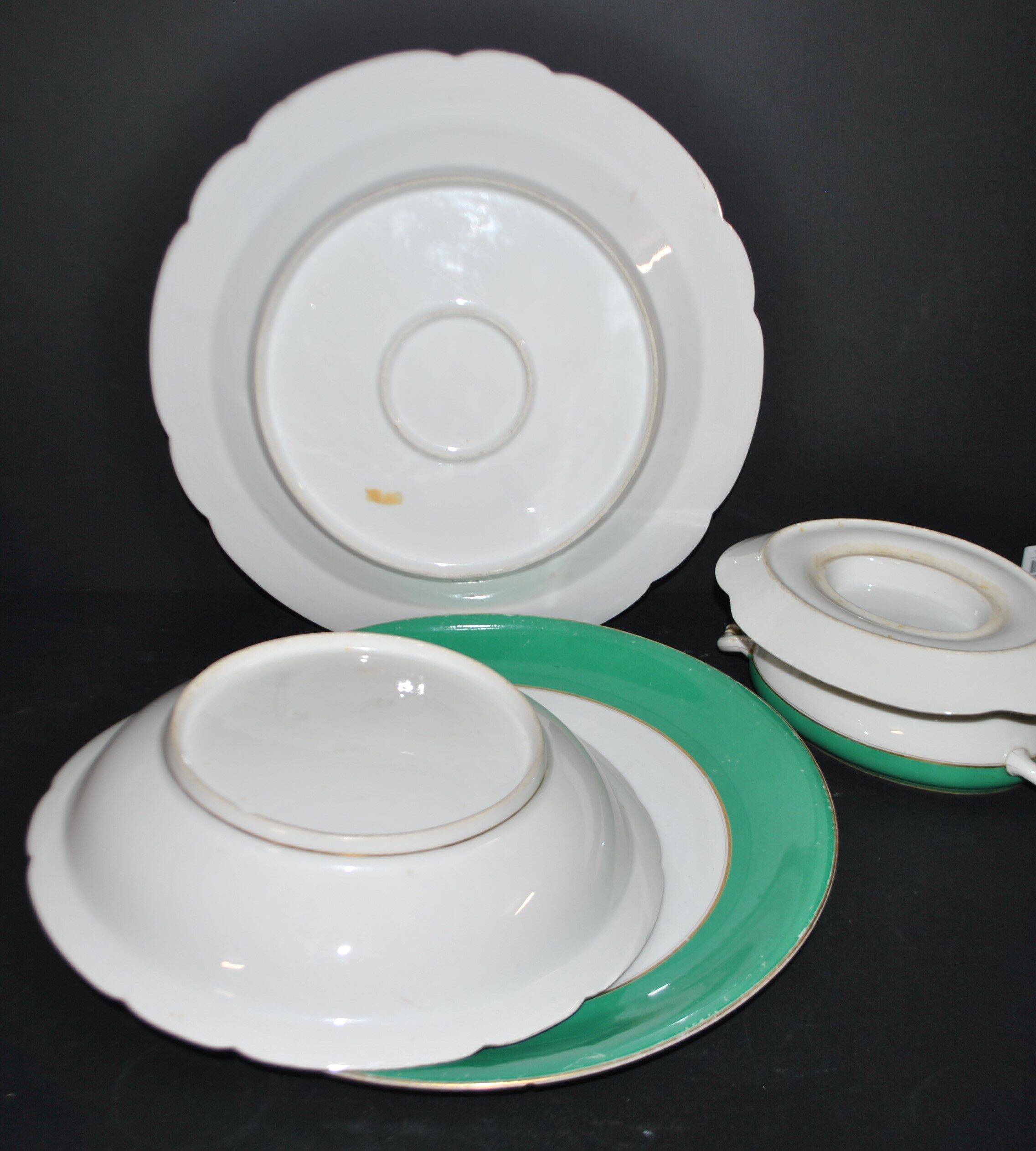 Paris porcelain set of 3 plates and a sauce boat with green border and gold monogram JC.