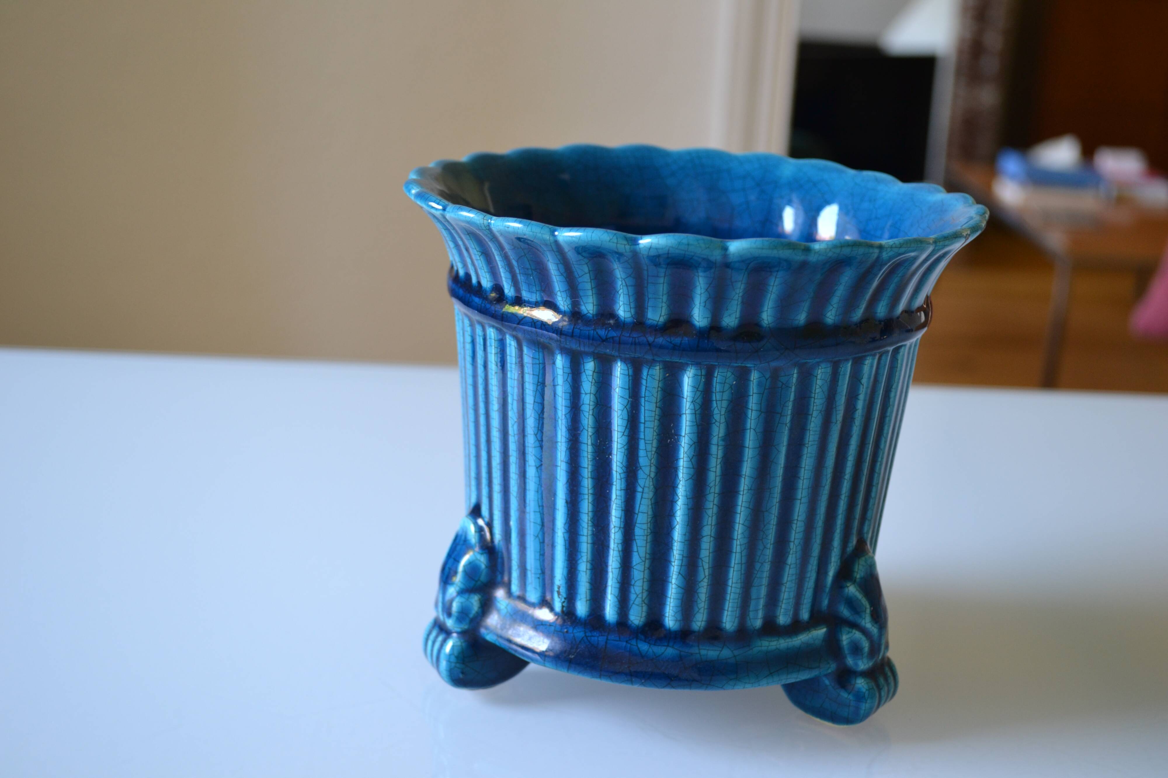 Cracked blue ceramic cache pot