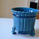 Cracked blue ceramic cache pot