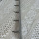 Stainless steel butcher's hook, known as a "wolf tooth bar."