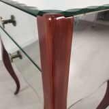 Glass art deco mirror beside table
