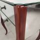 Glass art deco mirror beside table
