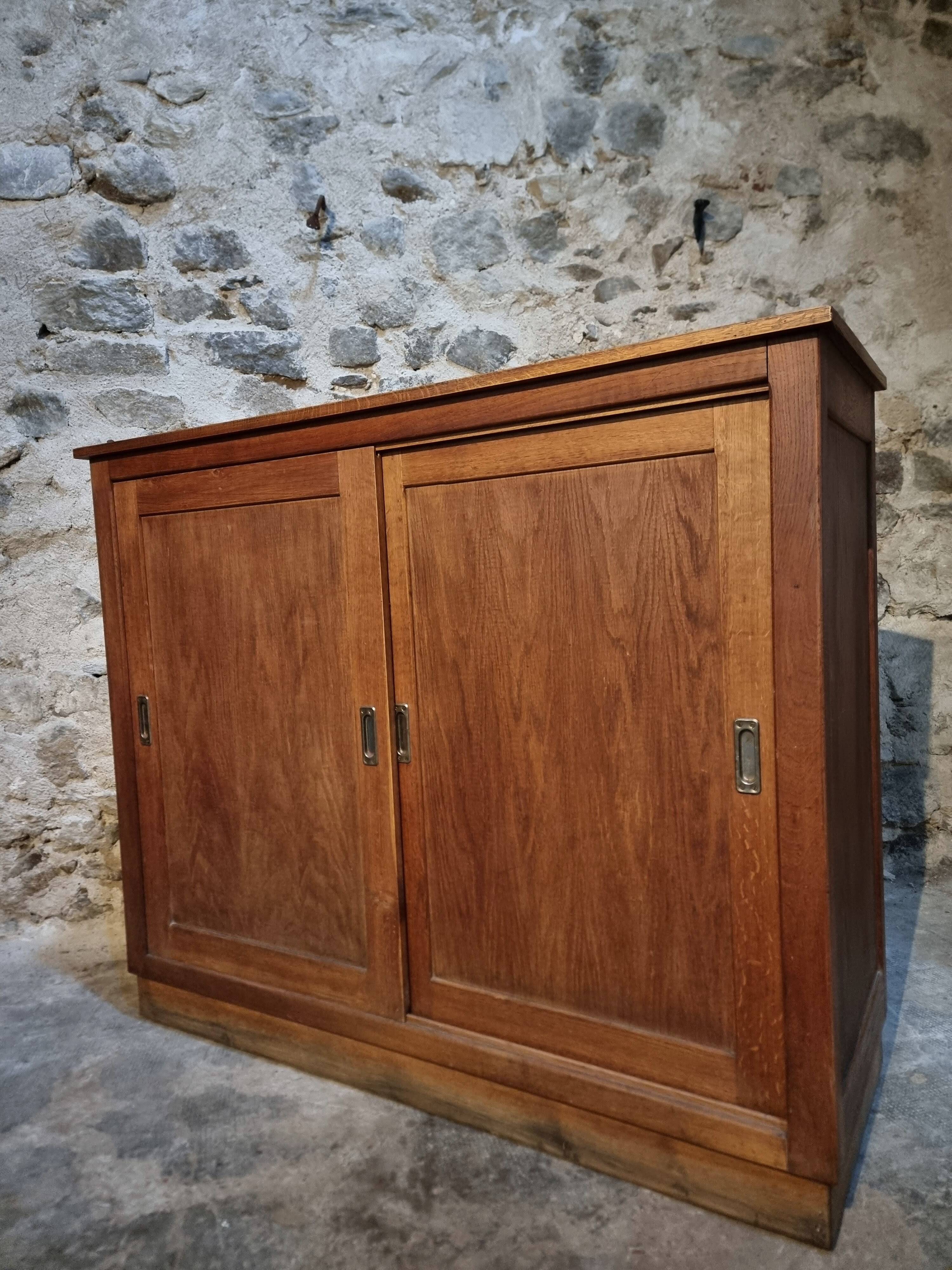 Oak sliding door wardrobe, 1920s