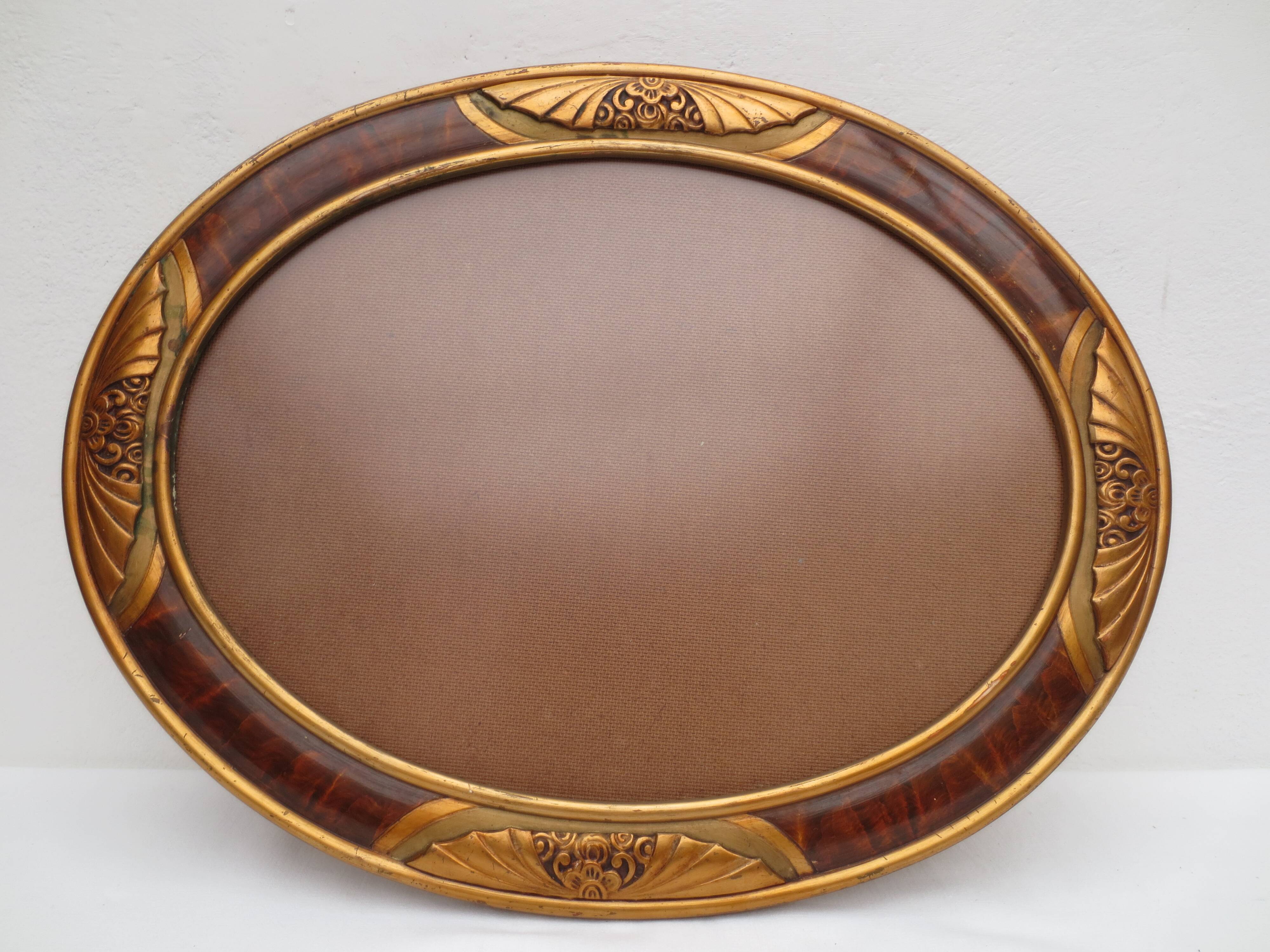 Cadre art nouveau ovale  en bois, décor flamé et  or