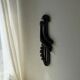 Brutalist wall sculpture with birds Ars Munda