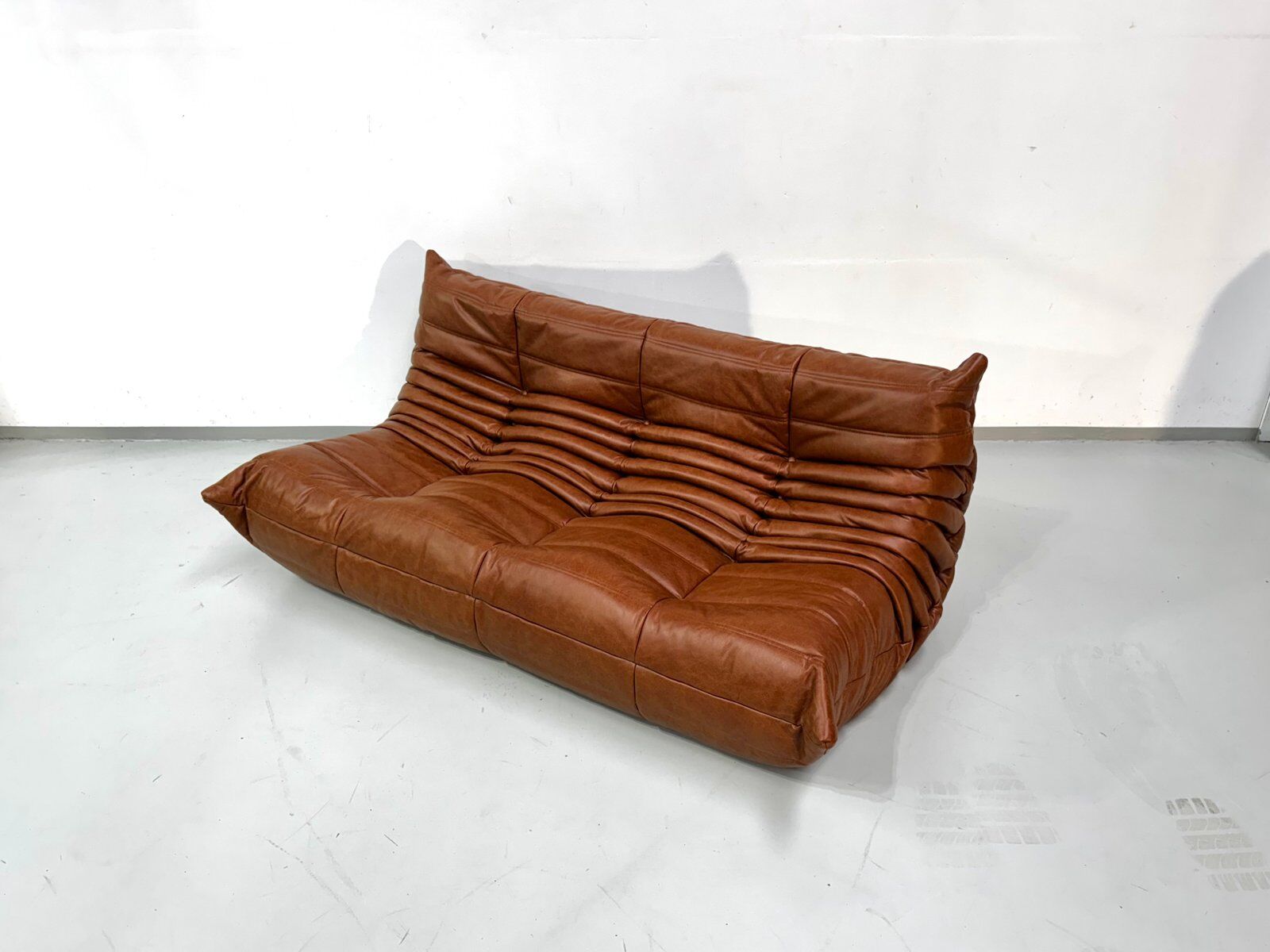 Togo sofa in cognac cowhide by Michel Ducaroy for Ligne Roset.