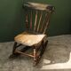 Rocking chair pour enfant en hêtre patiné, 19ème siècle