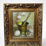 Still life with garlic, egg, and mortar signed Sarpe, 1979, oil on canvas.