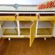 Buffet mado formica jaune moutarde pieds compas vintage