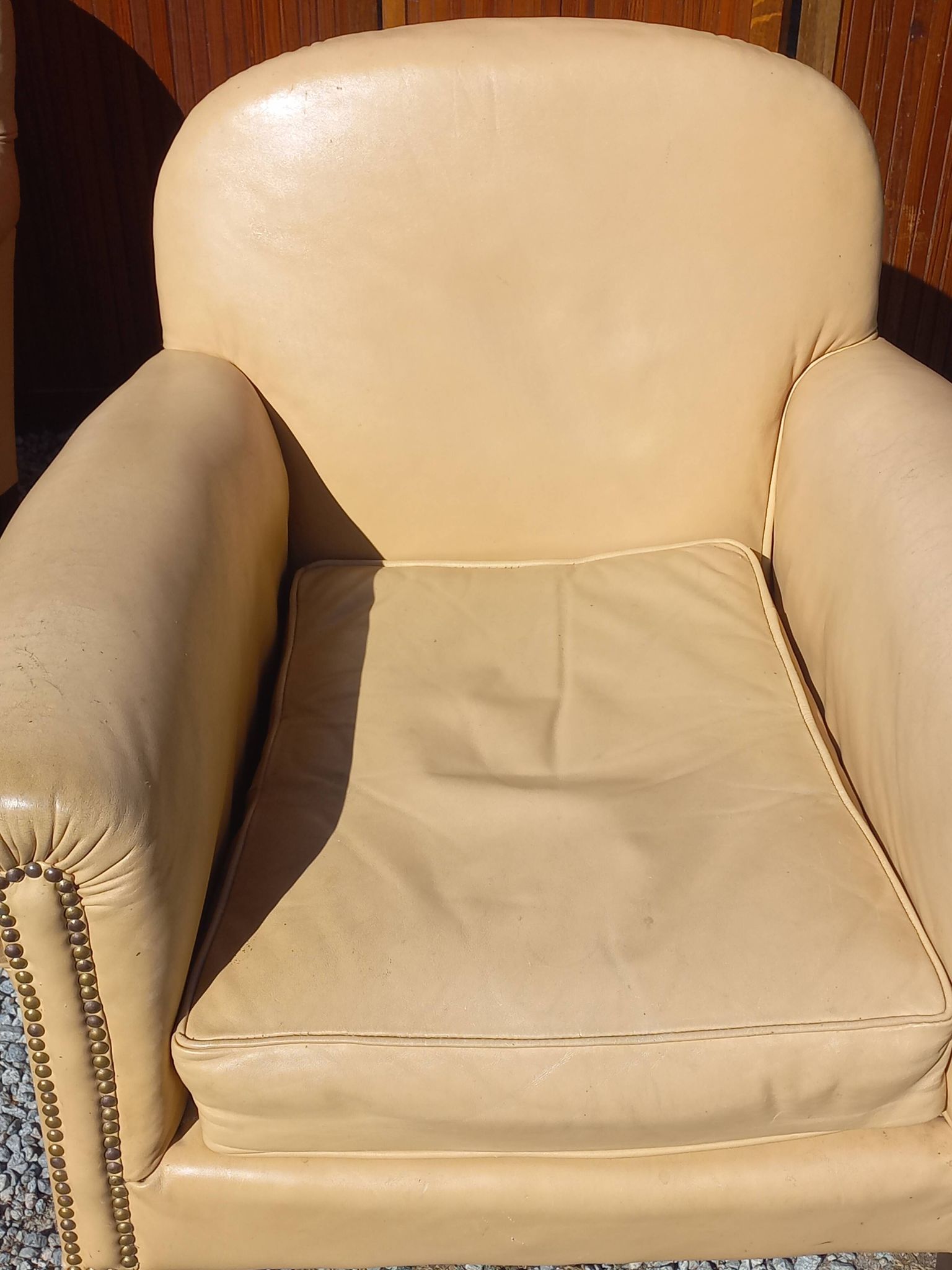 Pair of 1930s club armchairs in ivory leather.
