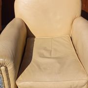 Pair of 1930s club armchairs in ivory leather.