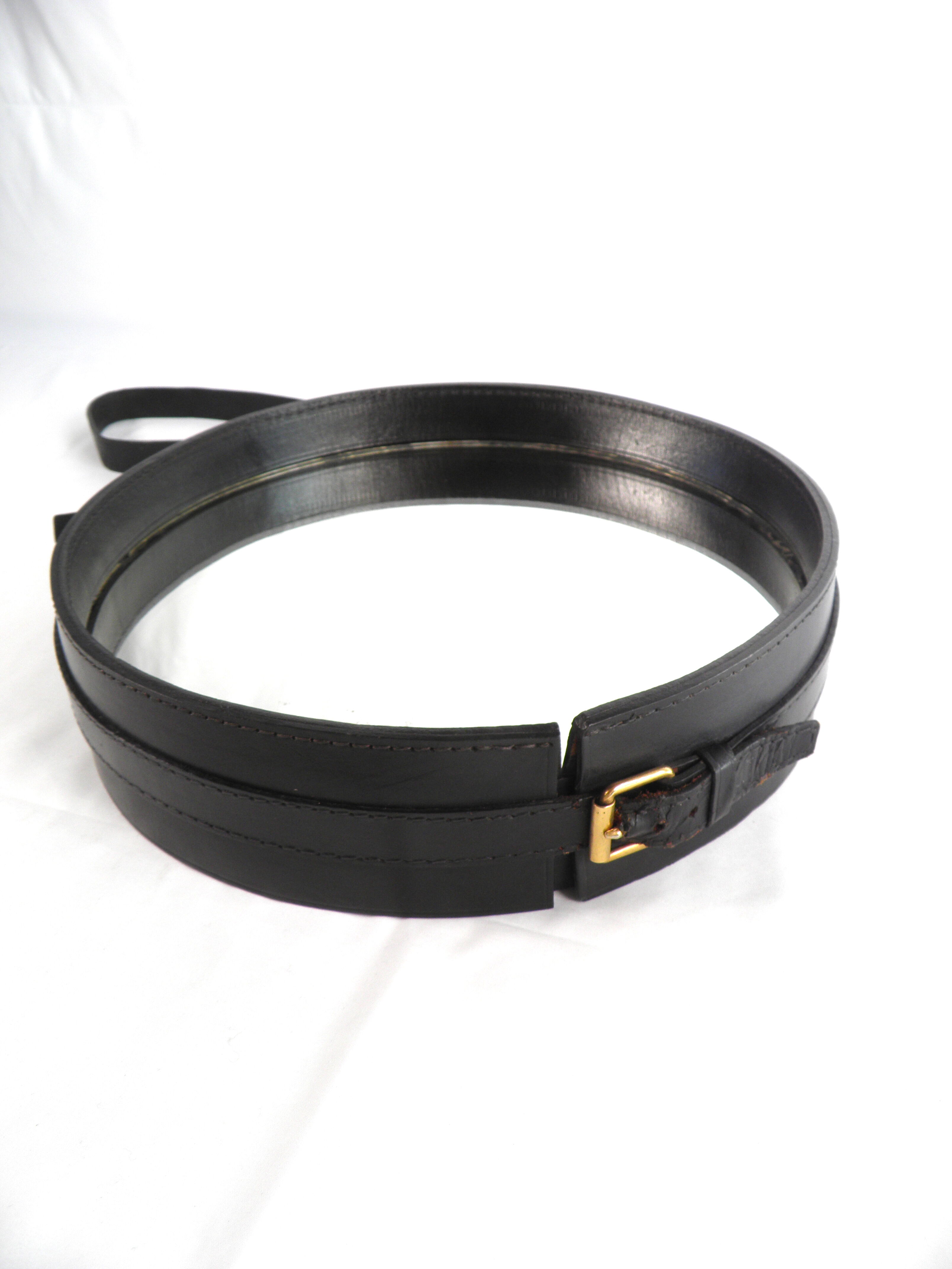 Circular mirror in black leather Jacques ADNET 1950