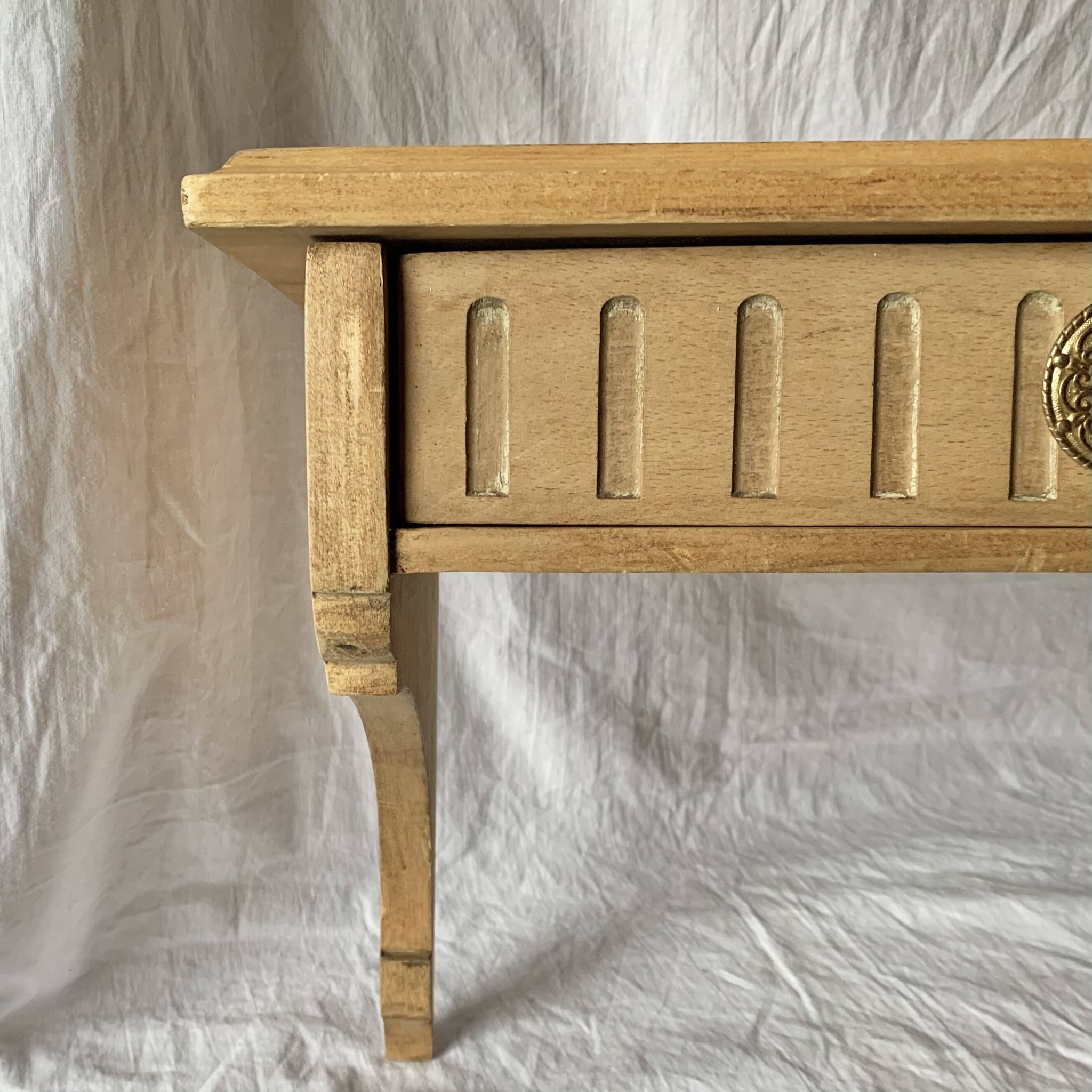 Old small hanging shelf in solid wood