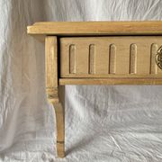 Old small hanging shelf in solid wood