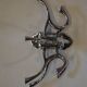 Chrome iron circular coat holder