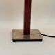Vintage table lamp with a square wooden column and brushed steel base.