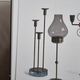 Gunnar Ander, four candlesticks, brass and glass, Ystad Metall, Swedish modern.