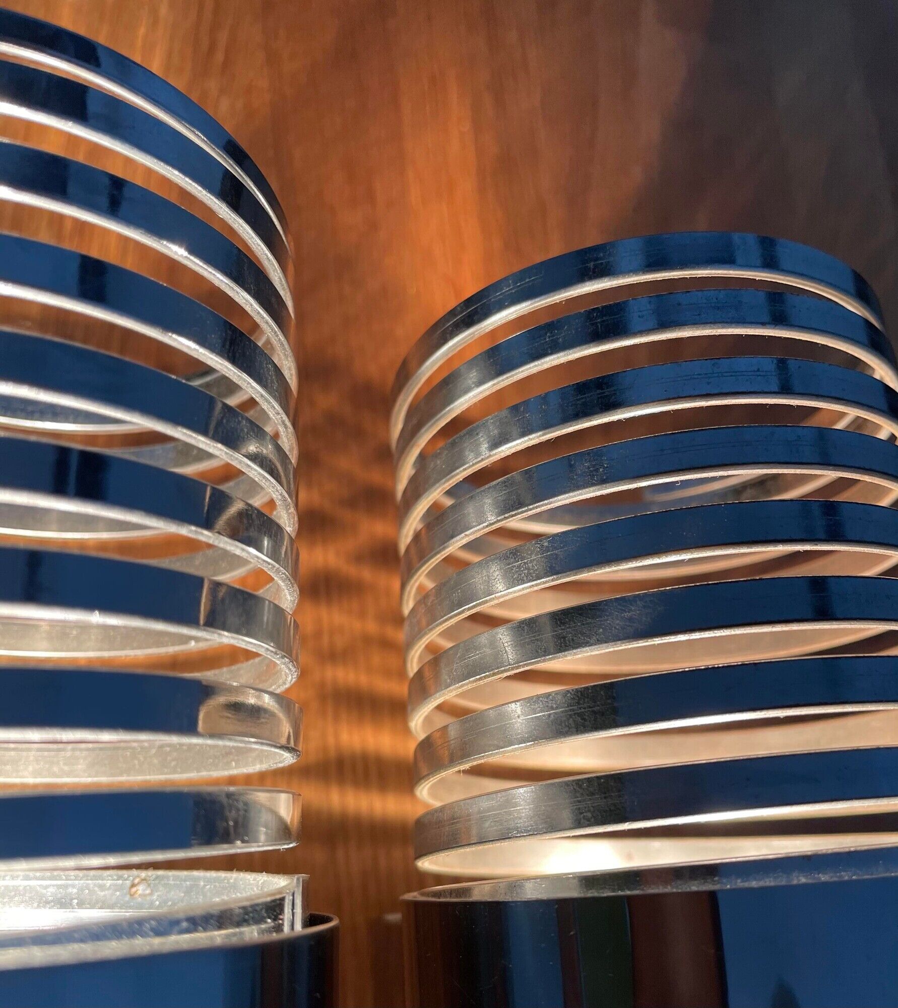 Pair of vintage wall lamps "Spring", chromed metal, France 1970