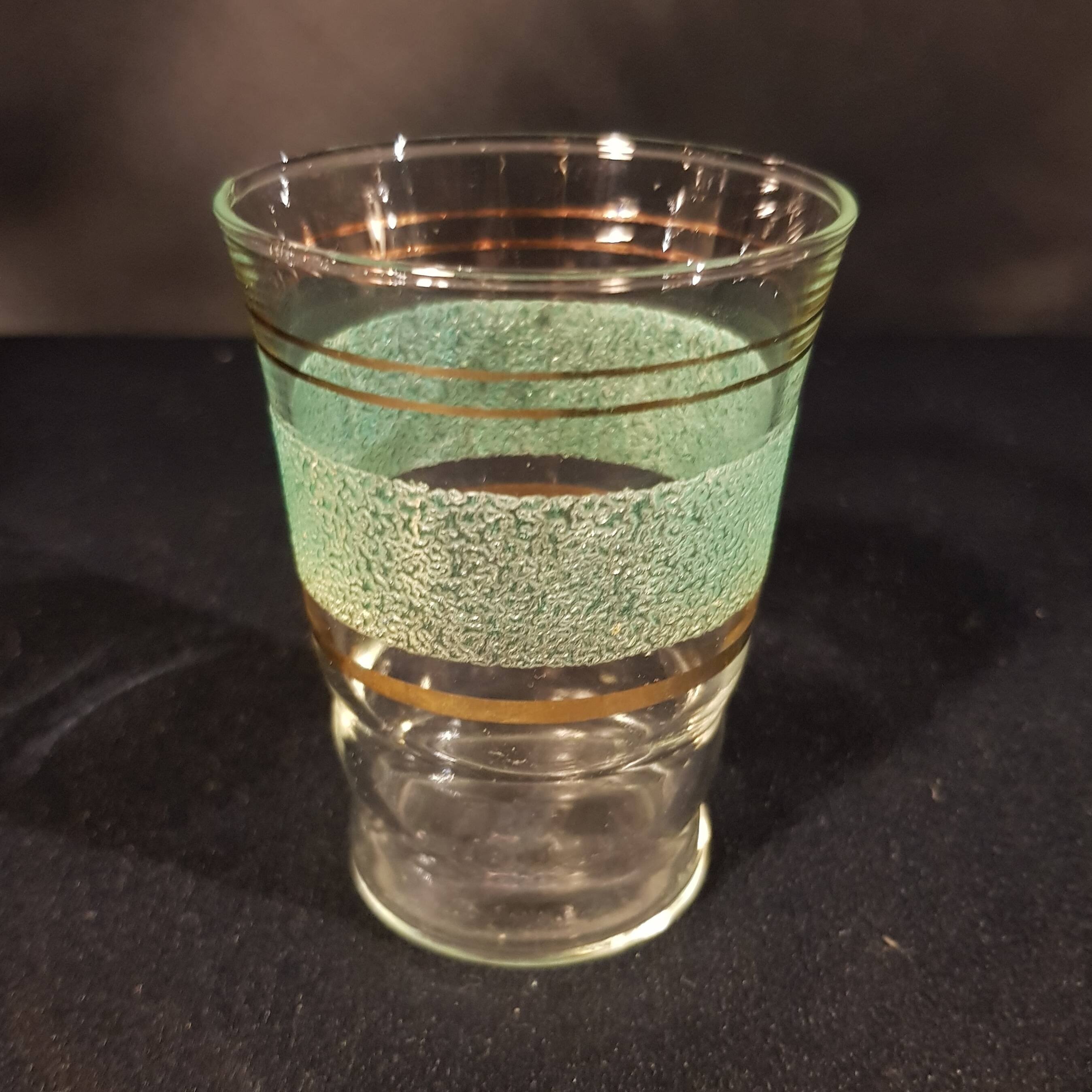 Carafe and glass in granite glass and gold edging