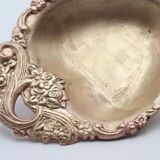 Empty brass heart pocket