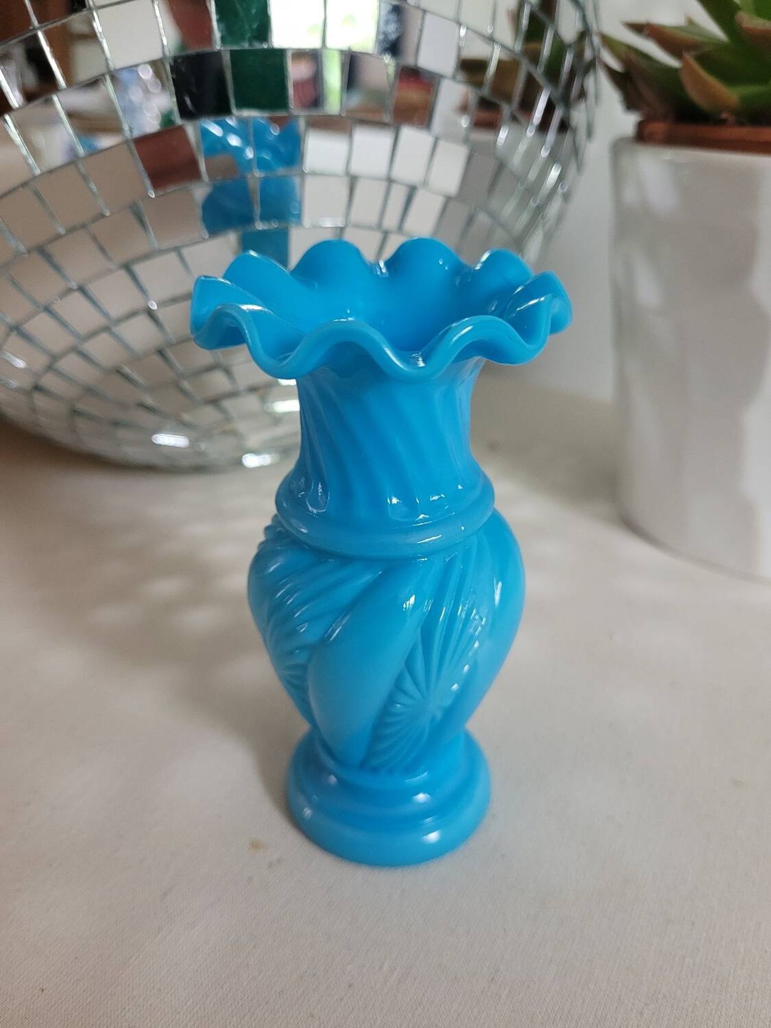 Lace-edged blue opaline vase