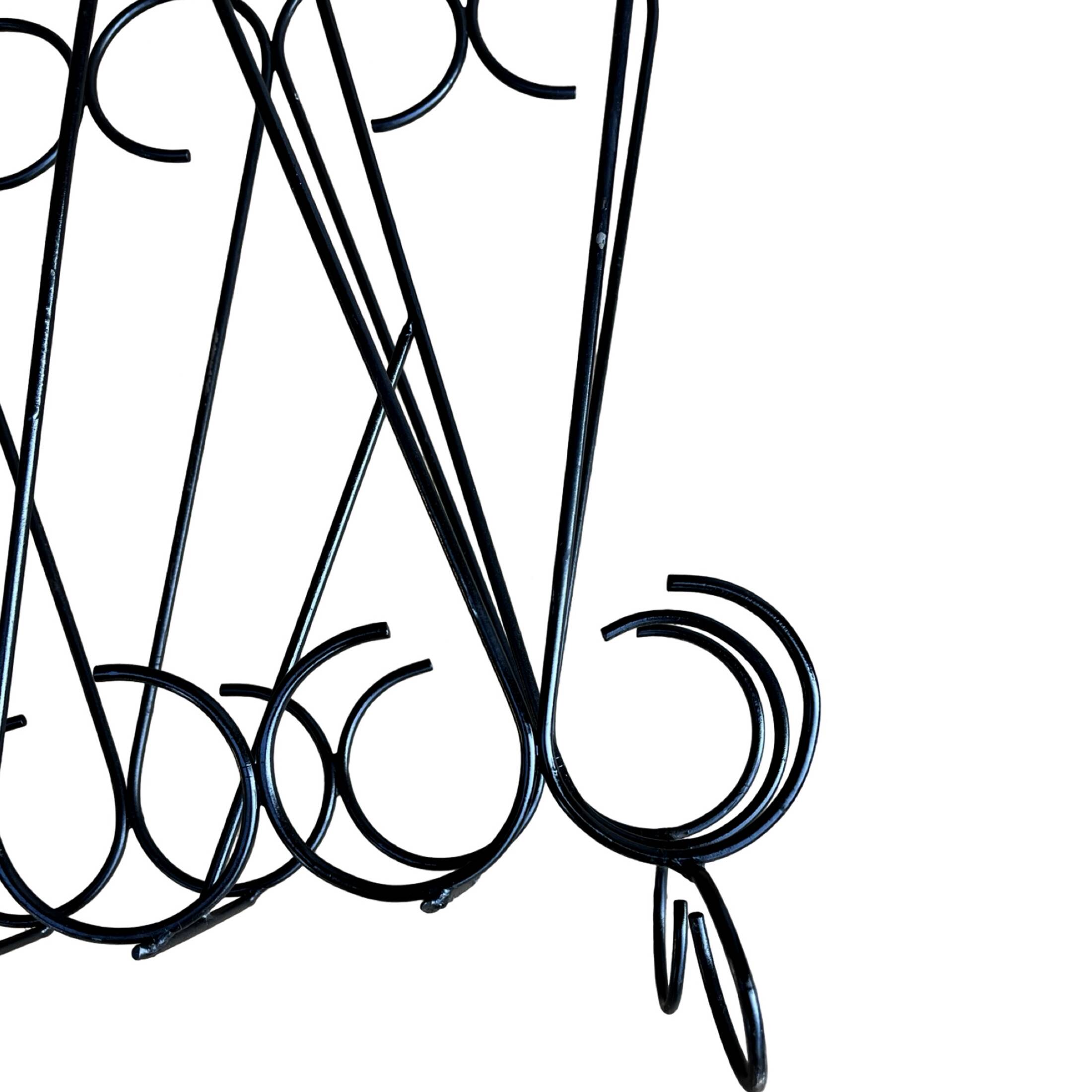 Openwork metalwork newspaper rack, Belgium 1970s