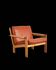 Brutalist armchair in oak and leather by Tage Poulsen, Denmark, 1970s.