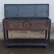 Console in old black wood with integrated chest