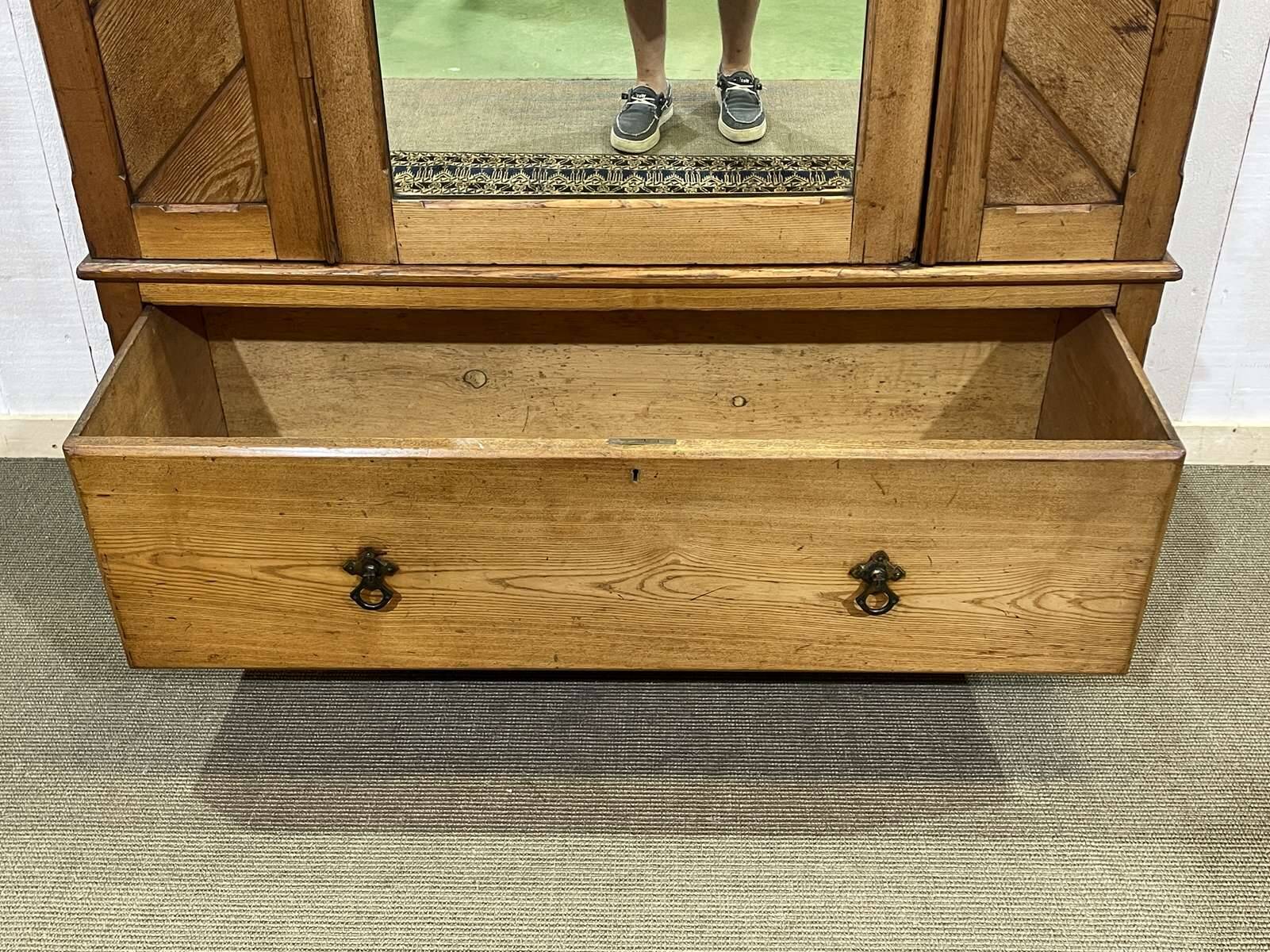 English oak wardrobe from the early 20th century.