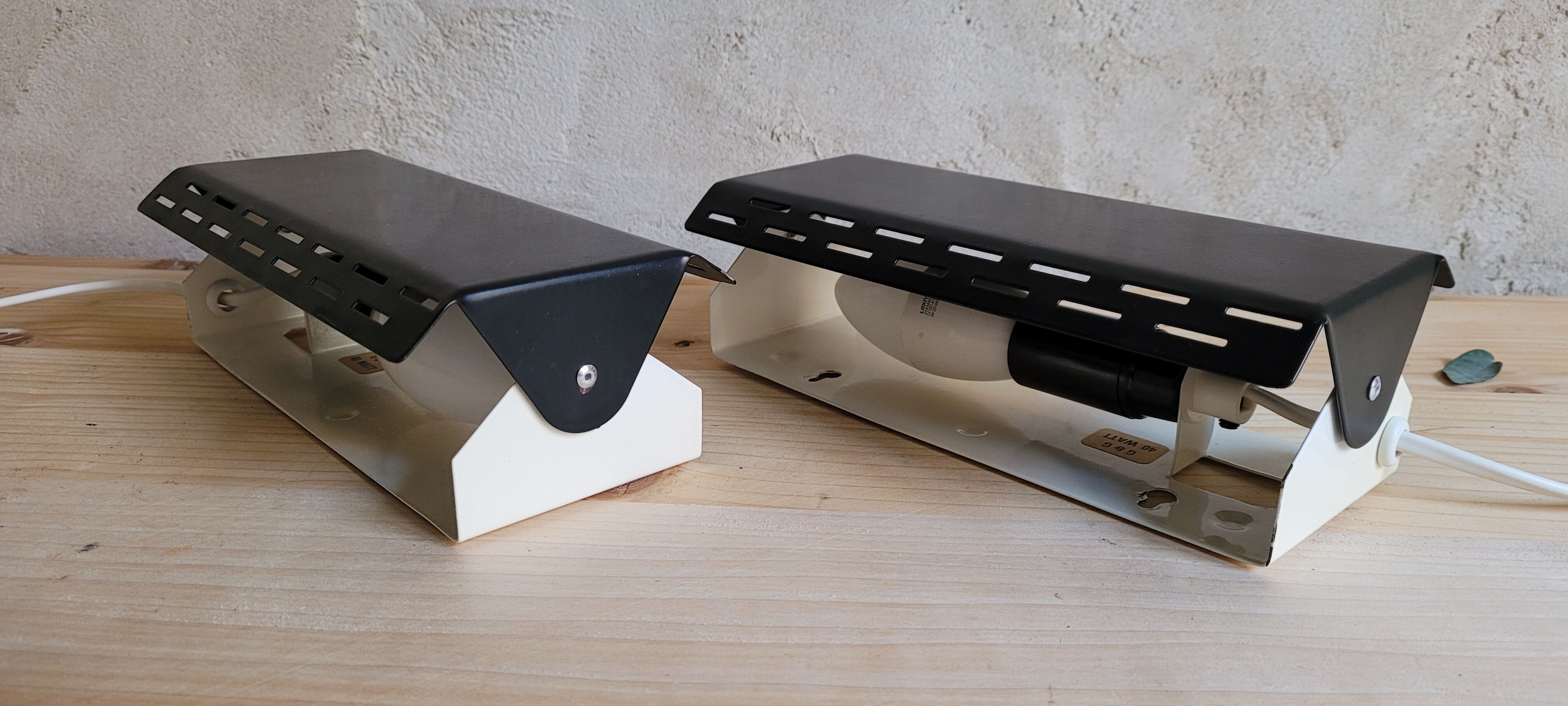 Pair of wall sconces with adjustable shutter