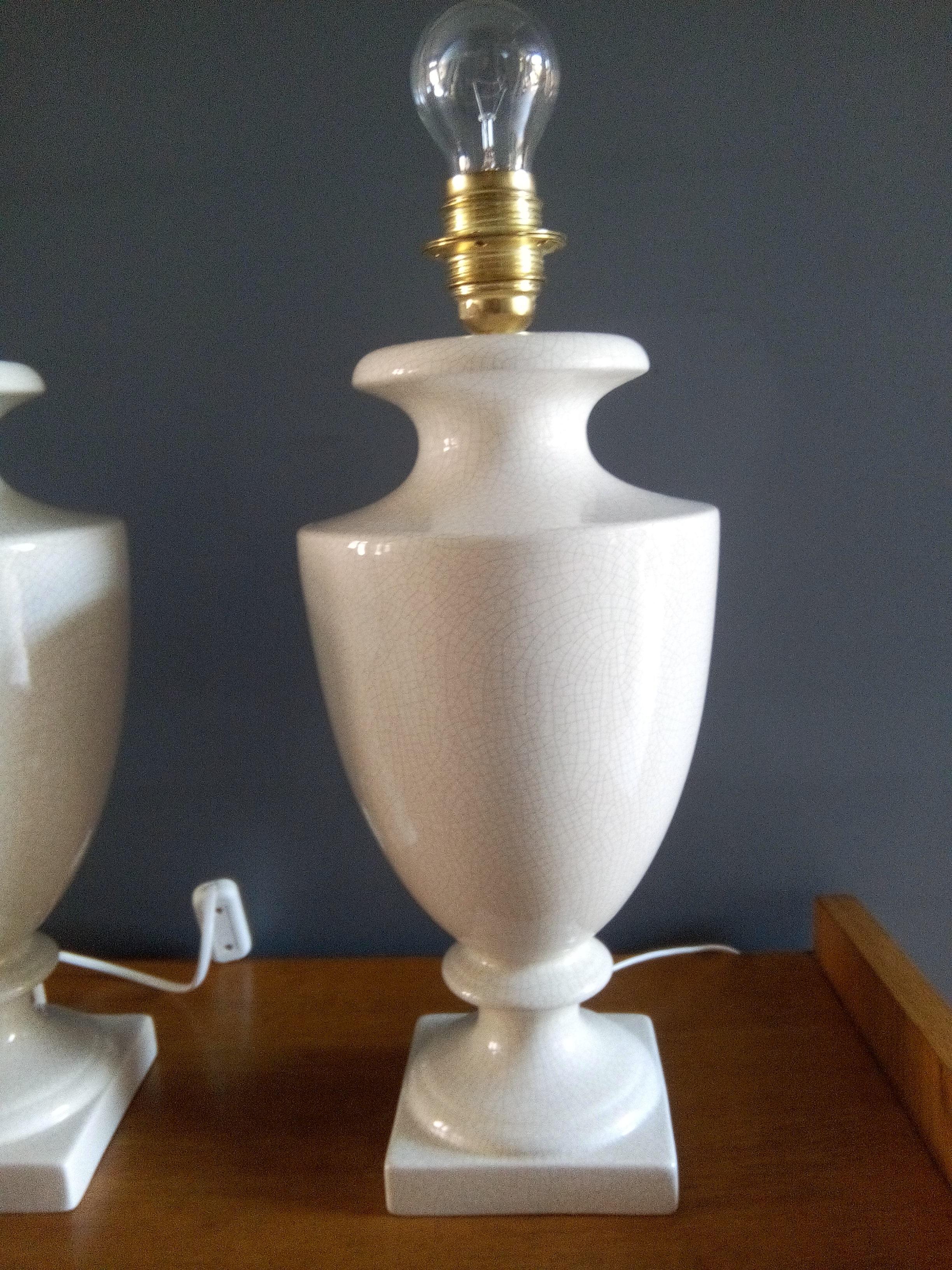 Pair of legs of cracked earthenware lamps