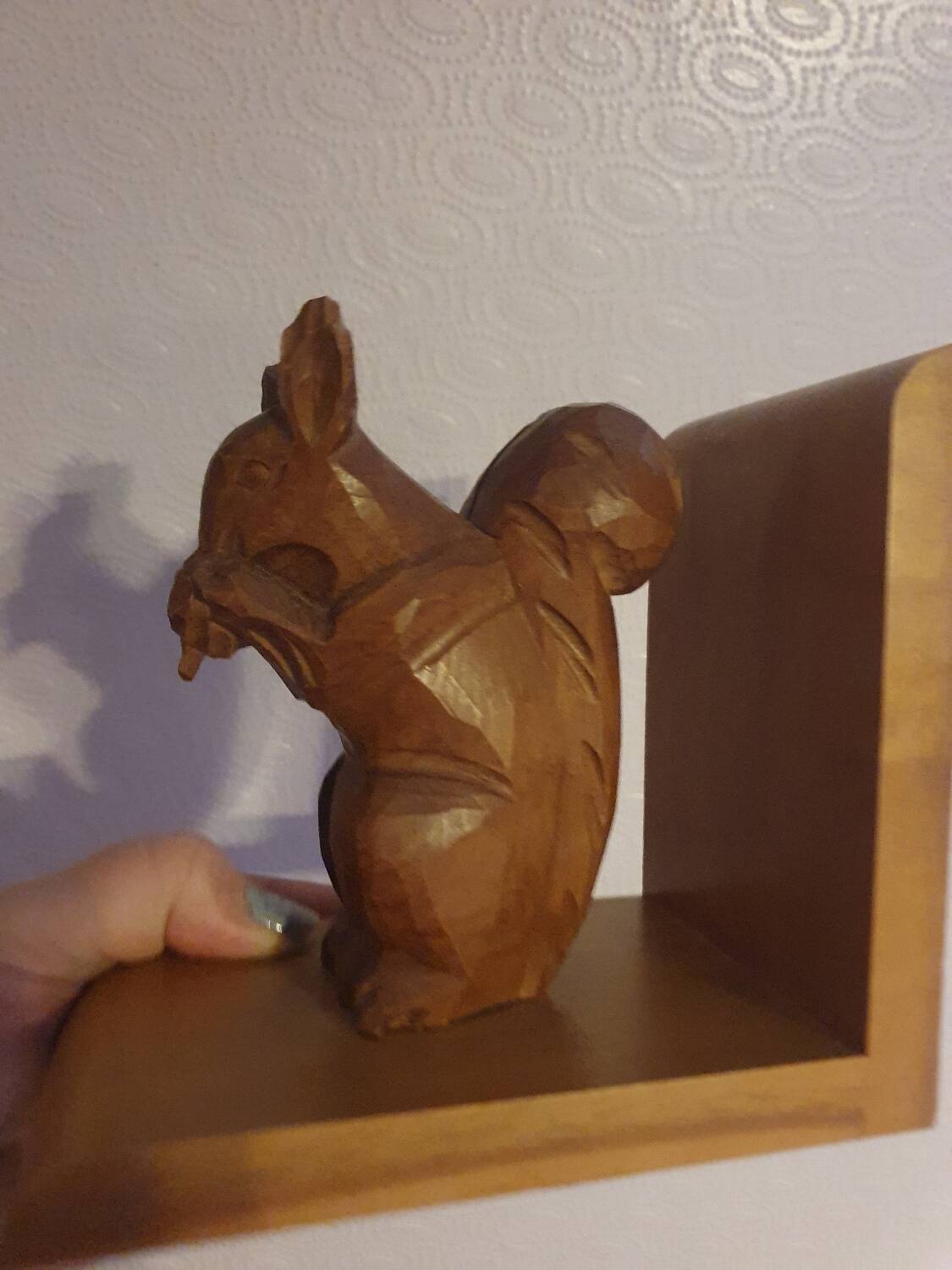 Vintage hand-carved wooden squirrel bookend