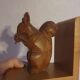 Vintage hand-carved wooden squirrel bookend