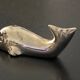 11 whale-shaped metal knife holders
