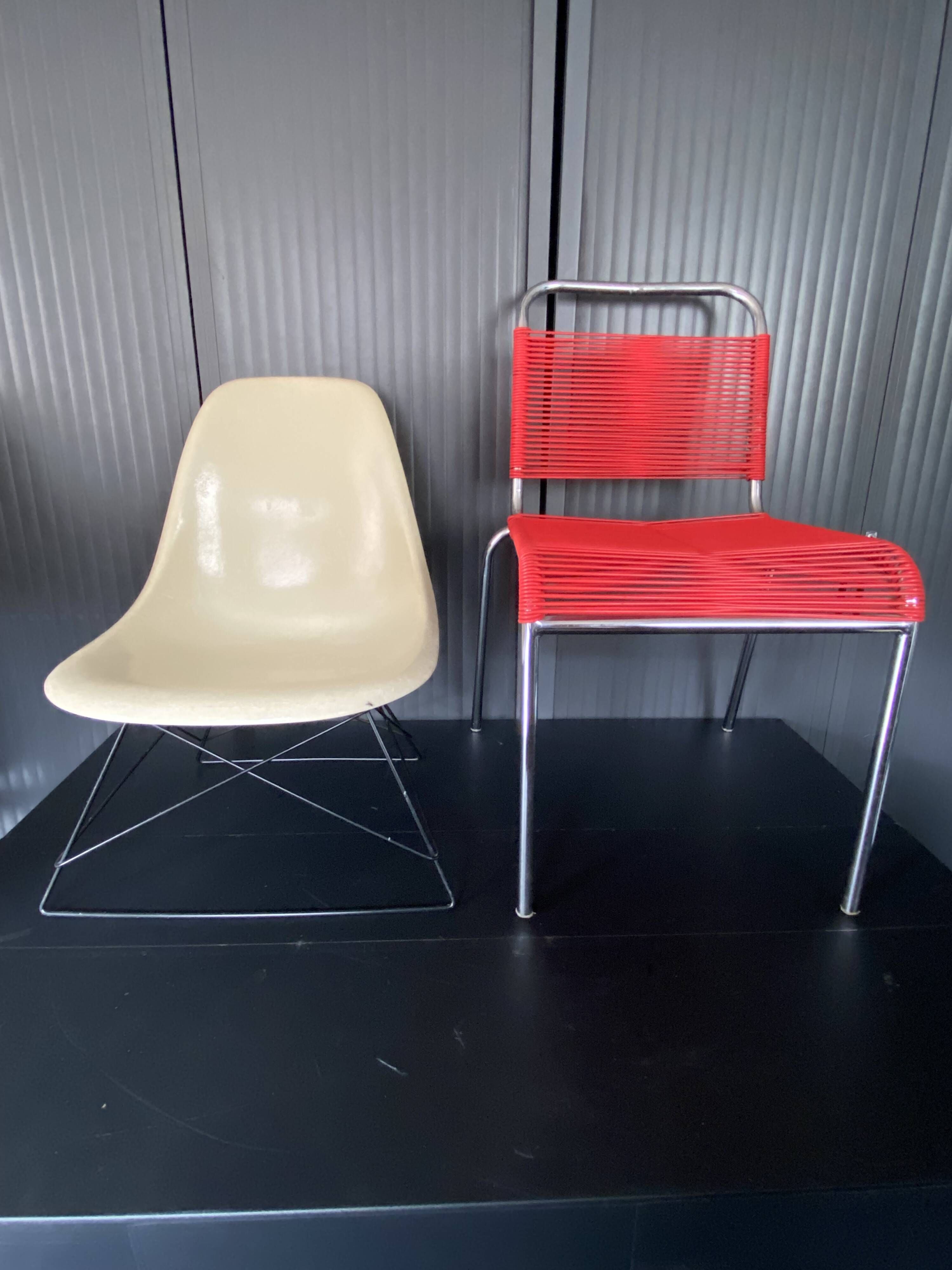 Eames lounge chair white fibre parchment base cat’s cradle Herman Miller