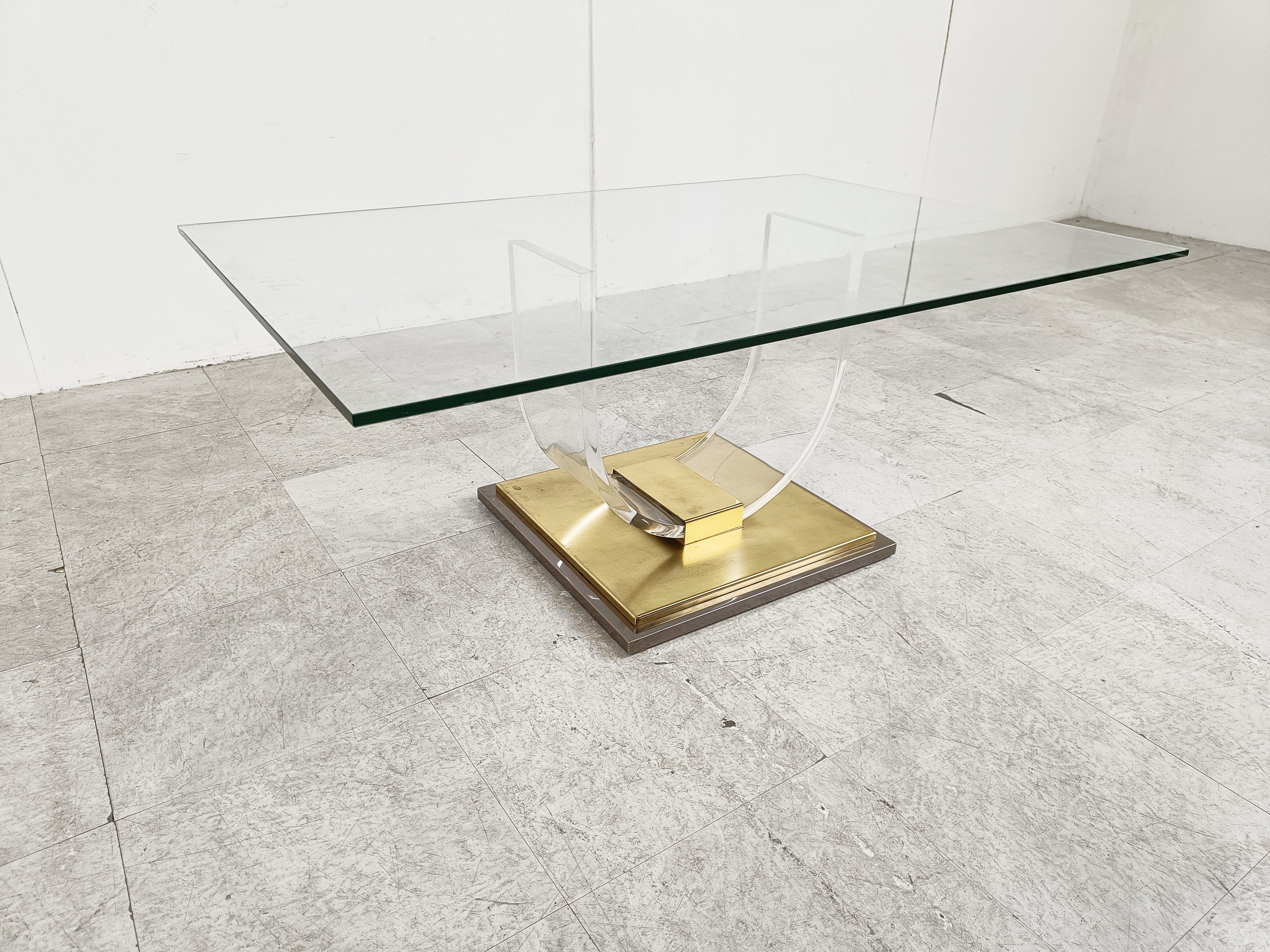 Lucite and brass arch coffee table, 1970s