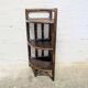 Rattan corner shelf