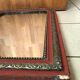 Antique Louis Philippe mirror in wood and plaster with a row of pearls and vintage friezes