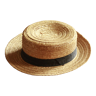 Old straw hat with black ribbon