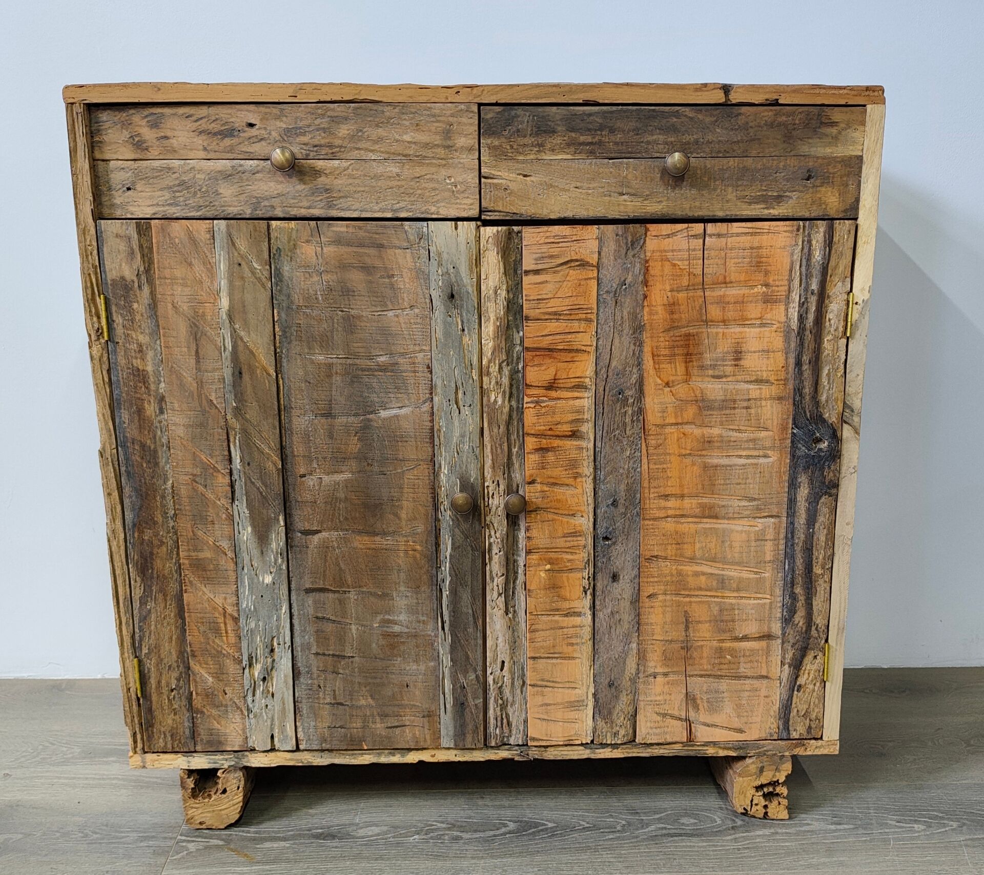 Two-door buffet with two drawers in antique wood.