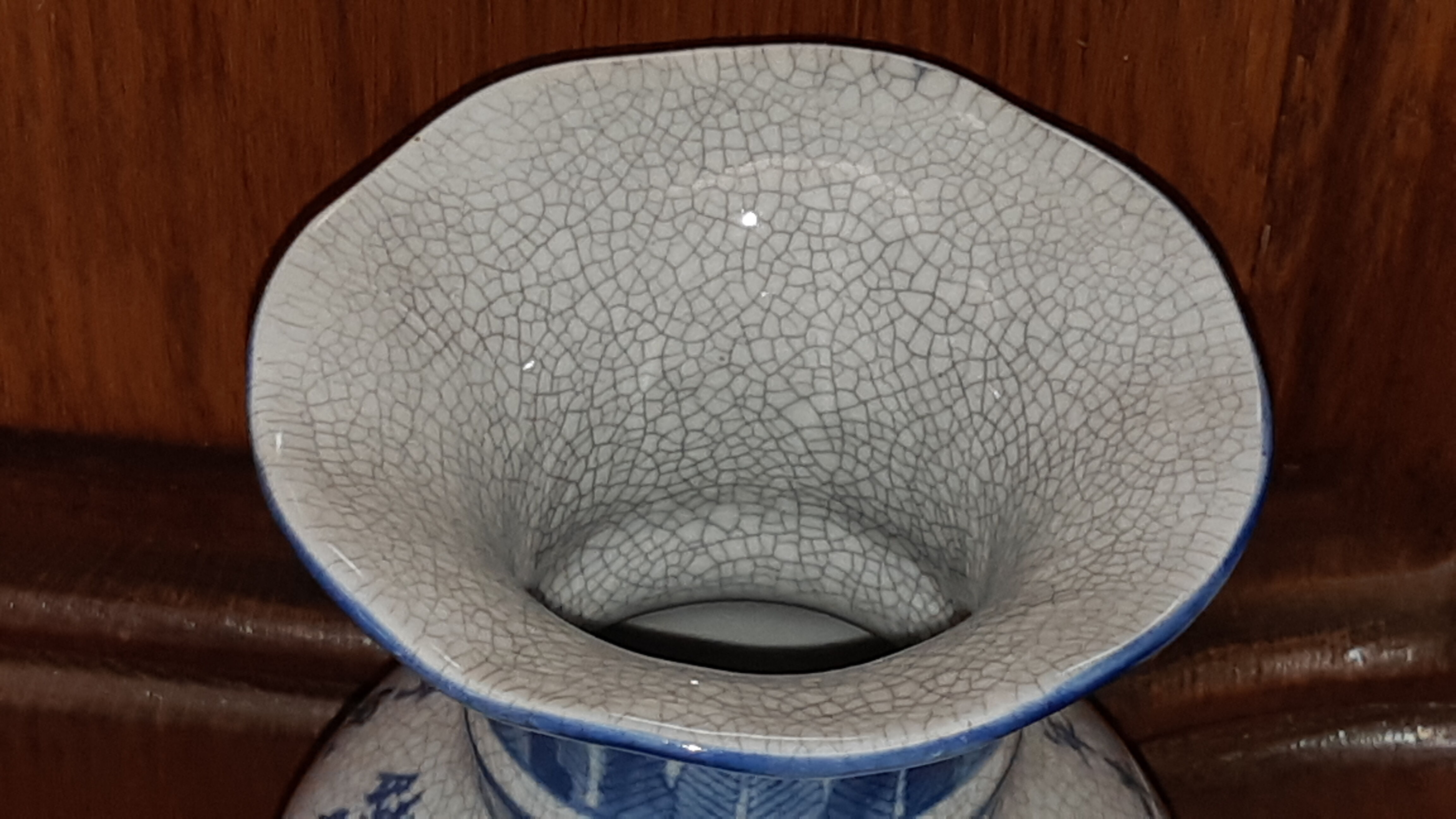 Ancient Chinese vase with blue decoration of sage and inscriptions