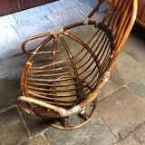 Swivel rattan armchair