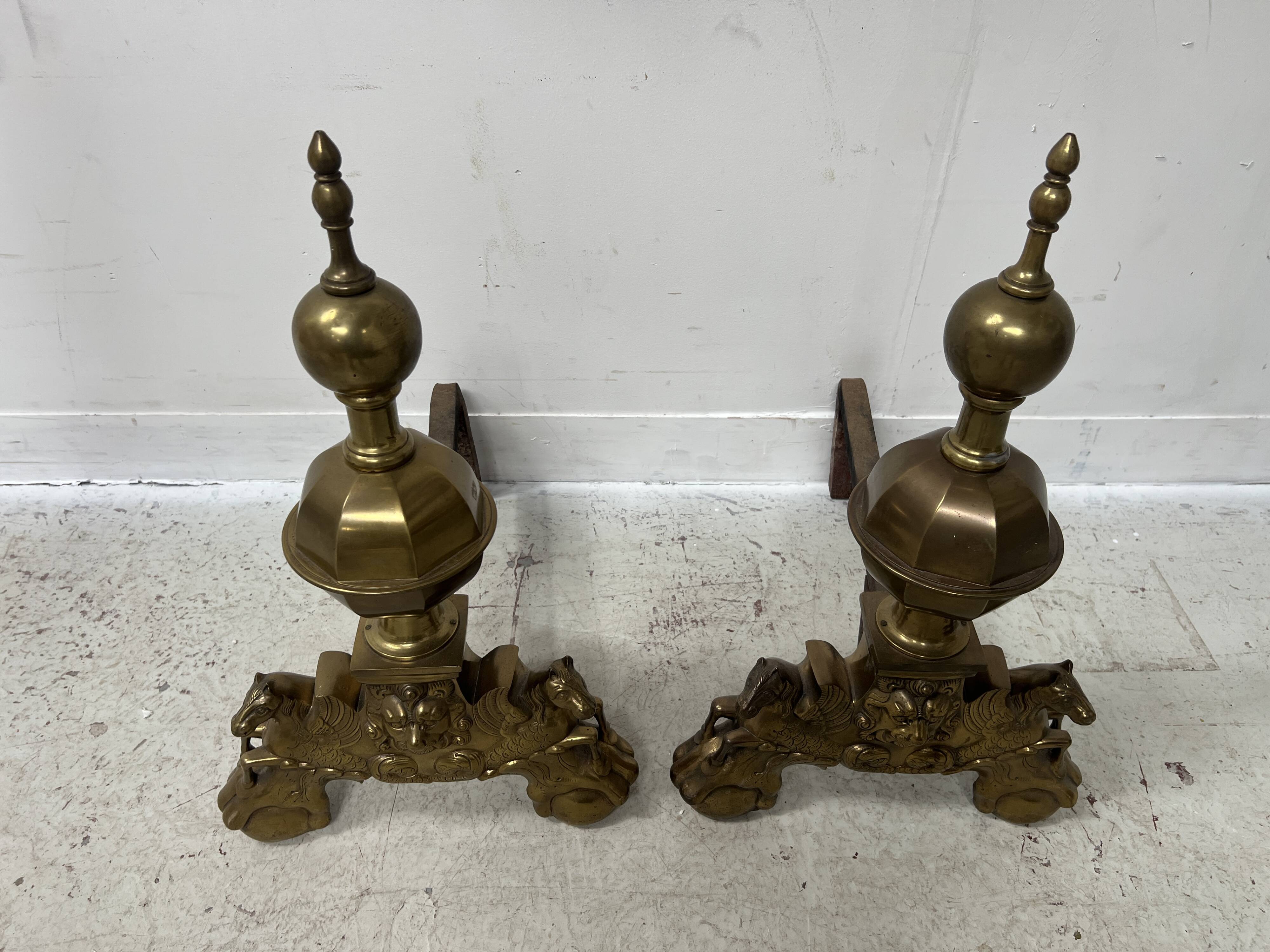Important pair of brass log holders from the 20th century.
