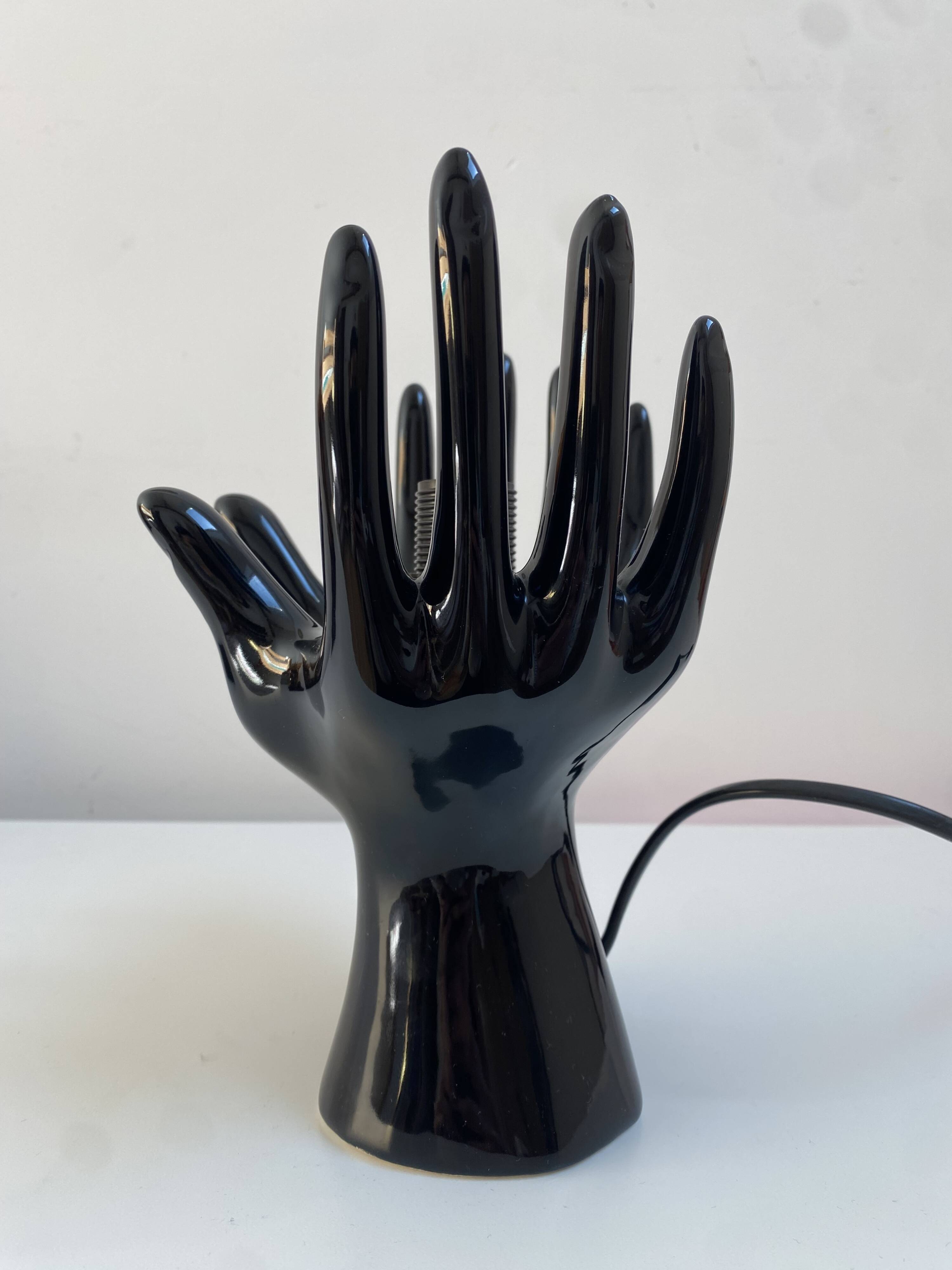 Sculpted ceramic globe lamp.