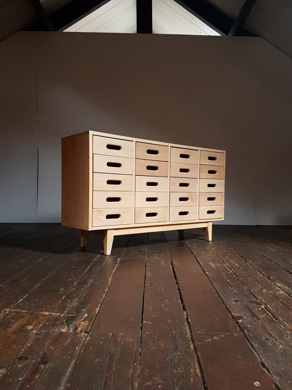Merchandising chest of drawers by James Leonard Esavian