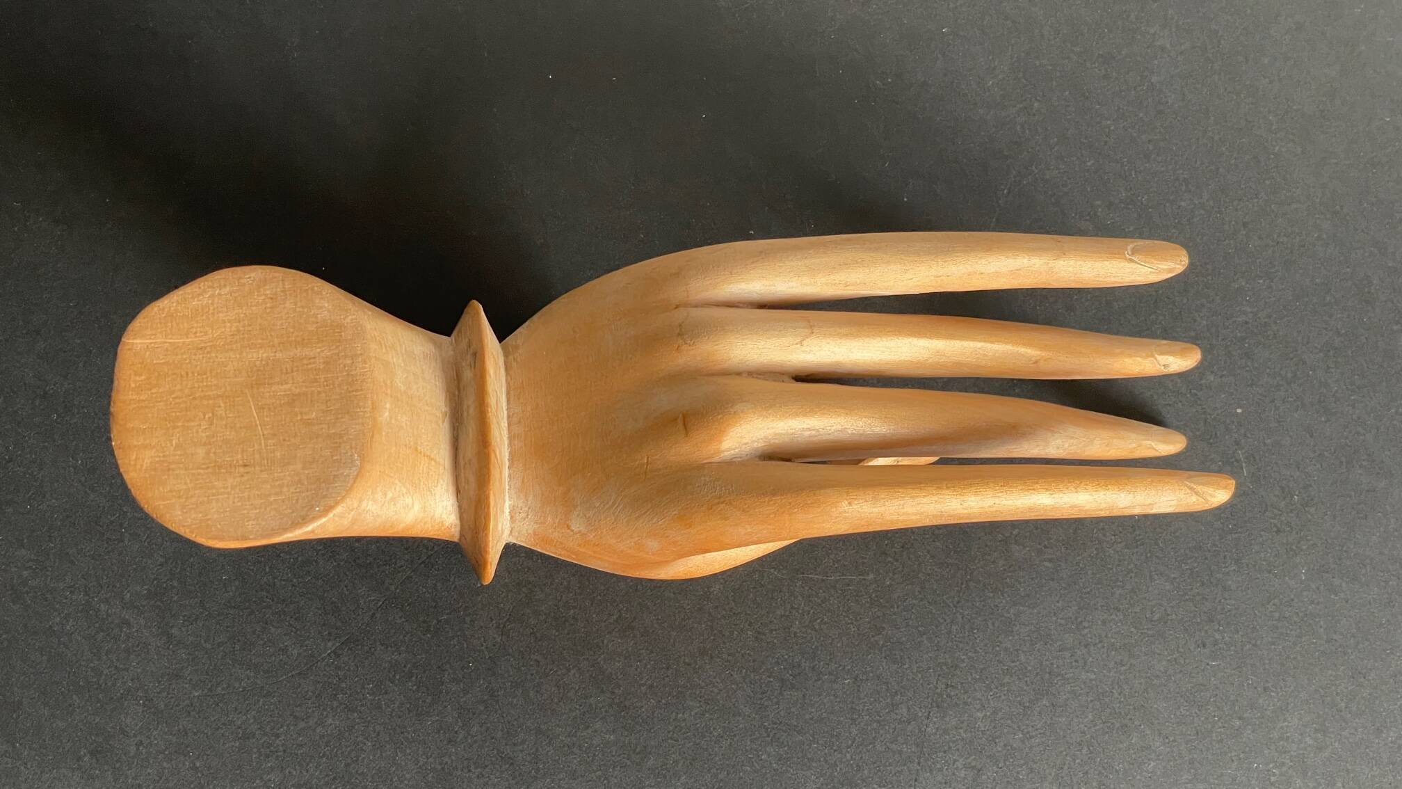 Wooden hand sculpture