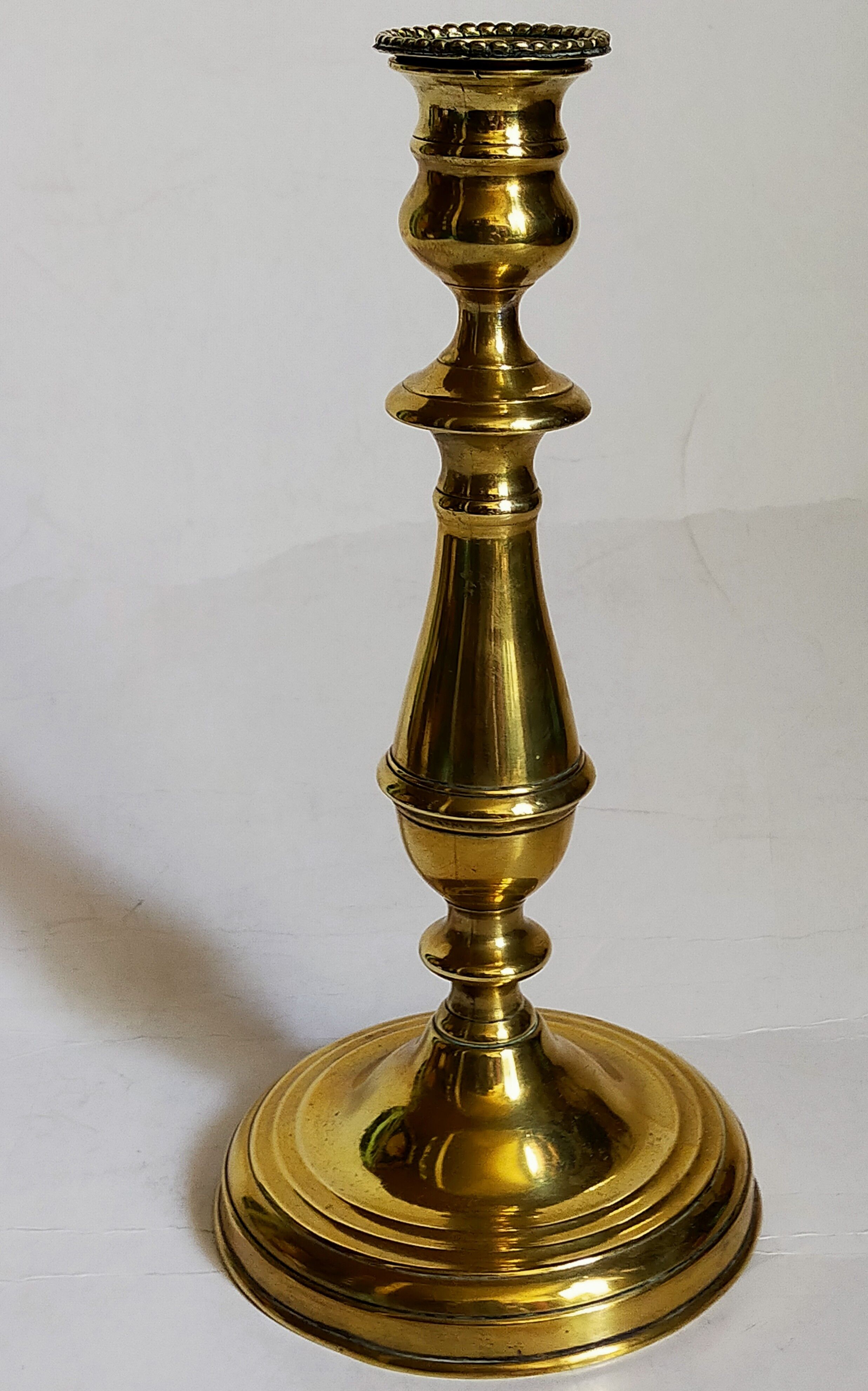 Old solid brass candle holder