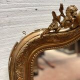 Miroir de style Louis XV en bois et stuc doré XX siècle